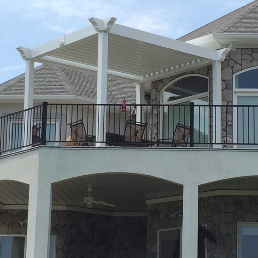 Premier Pergola opens and closes. Close to protect patio from sun and rain.